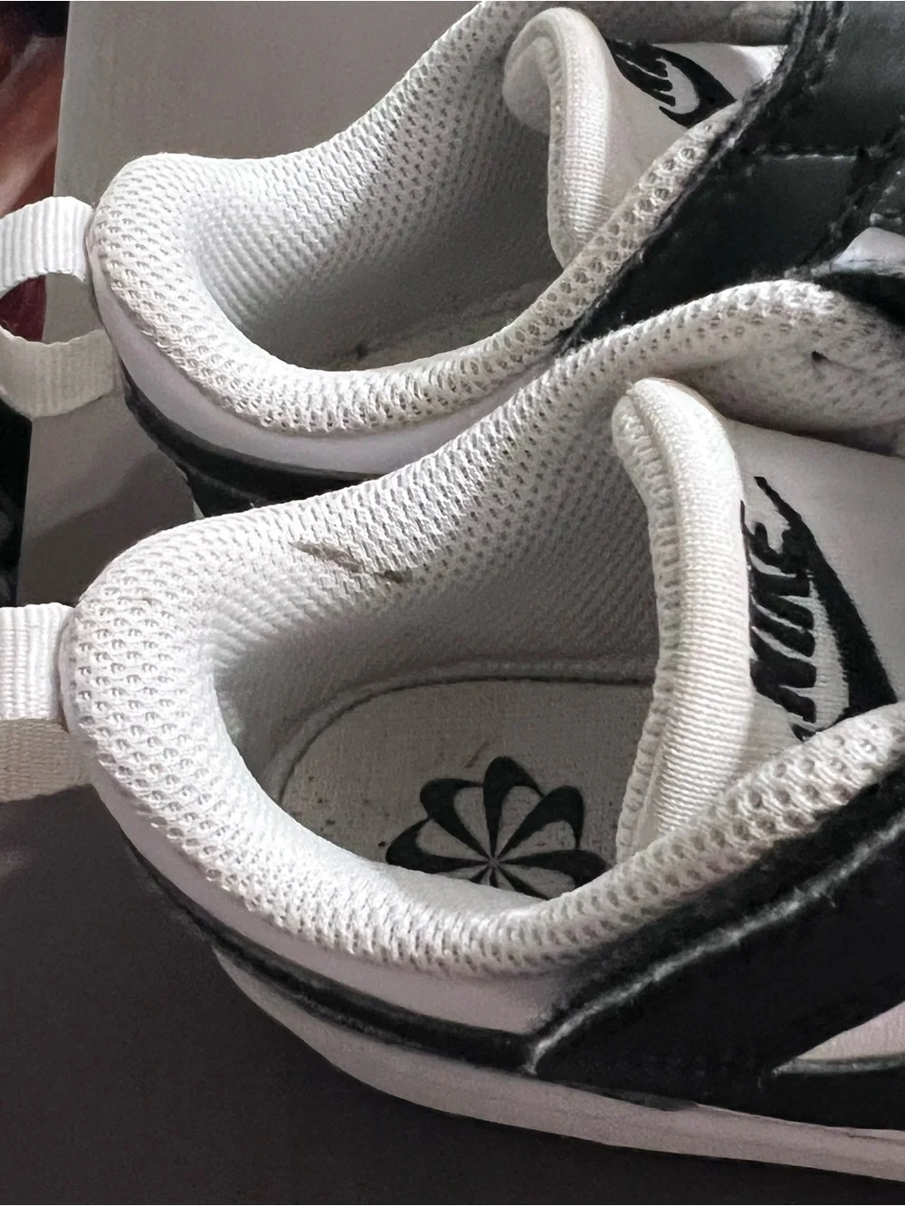 Kids 11c Nike White and Black Low-Top Sneakers